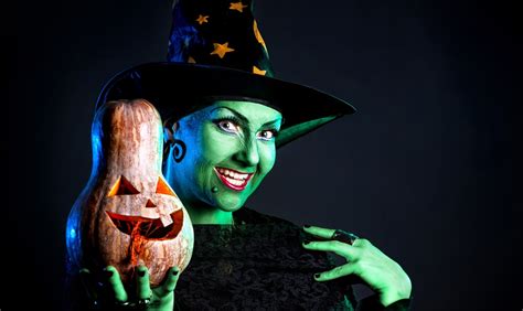 Halloween witch with a green face